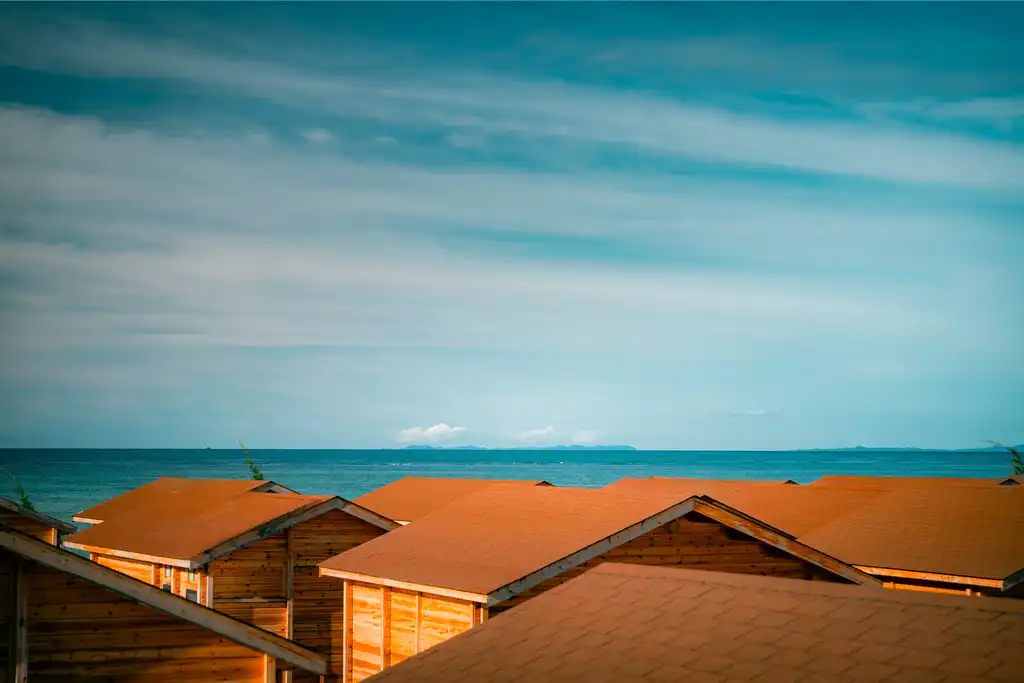 Breathtaking view of the ocean from the private balcony of a double-storey bungalow at JSK Mantanani Island Resorts.